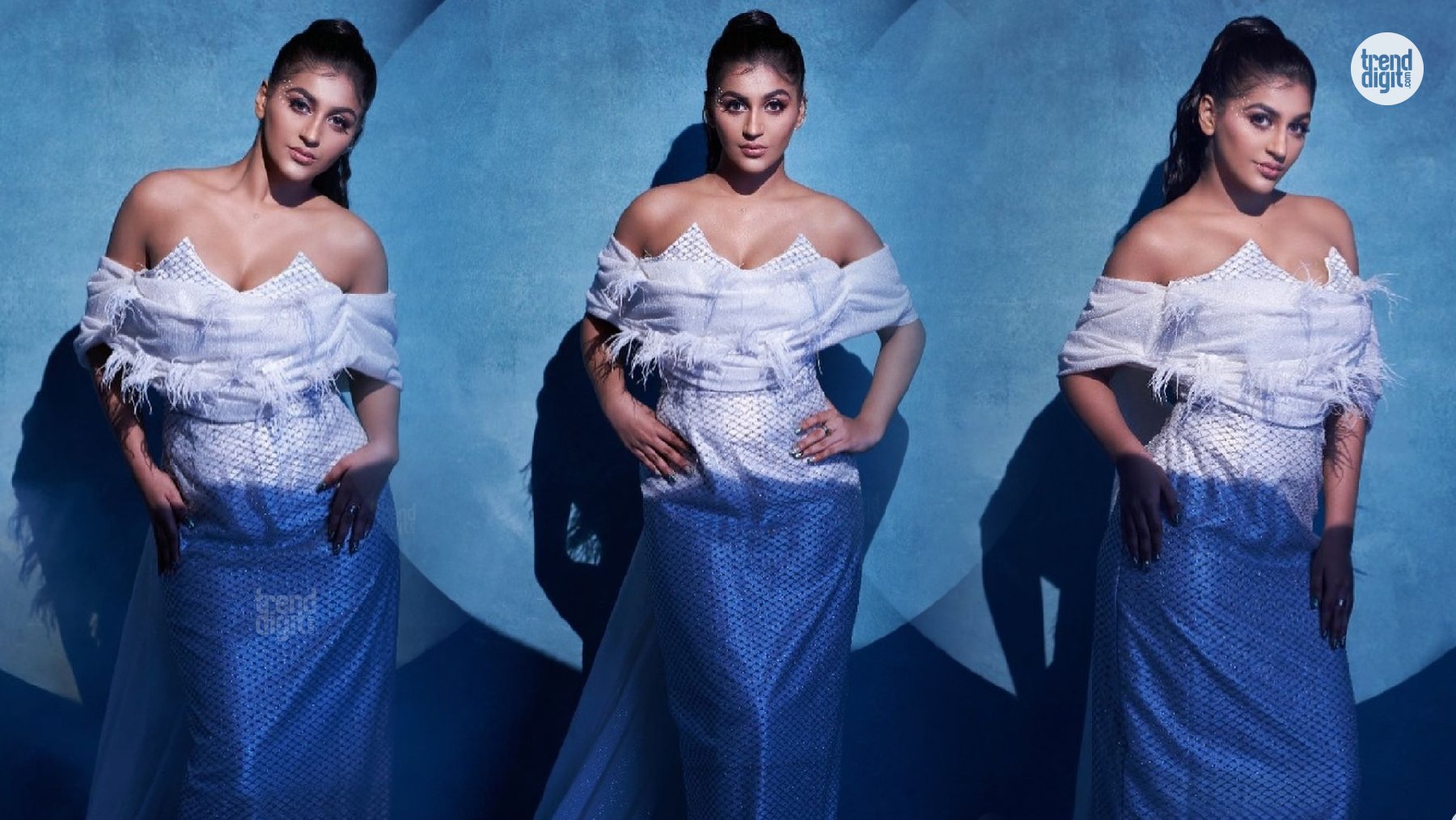 Yashika Aannand Dazzles in Silver Off-Shoulder Gown with Draped Feathered Elegance